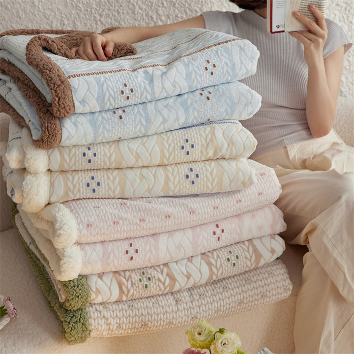 Cozy throw blanket with Sherpa lining and jacquard pattern