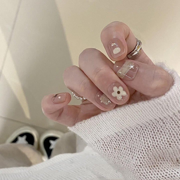 Artificial nails with elegant floral designs Bowlift