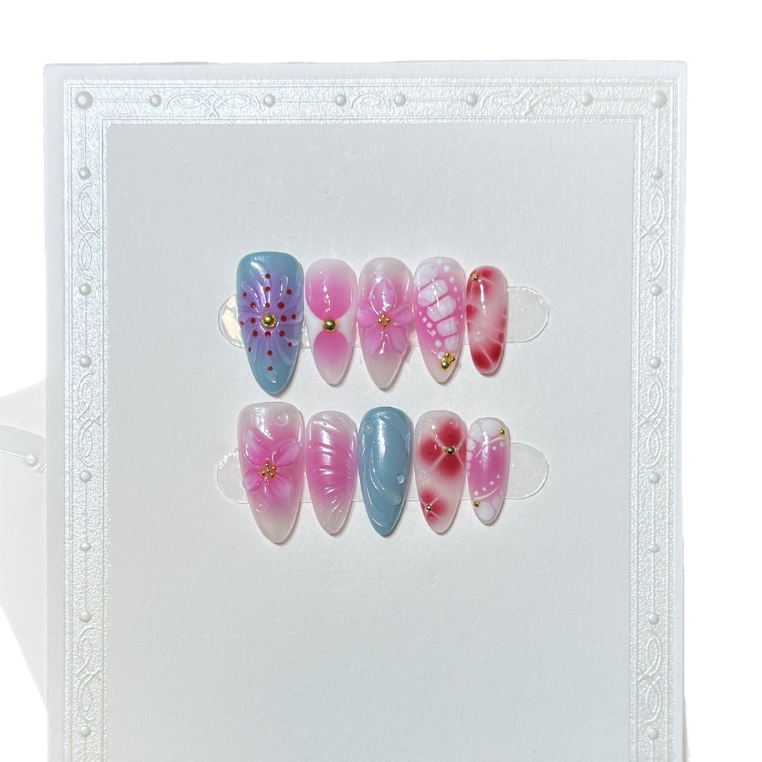 Artistic Press-On Nail Set with Floral and Abstract Designs Bowlift