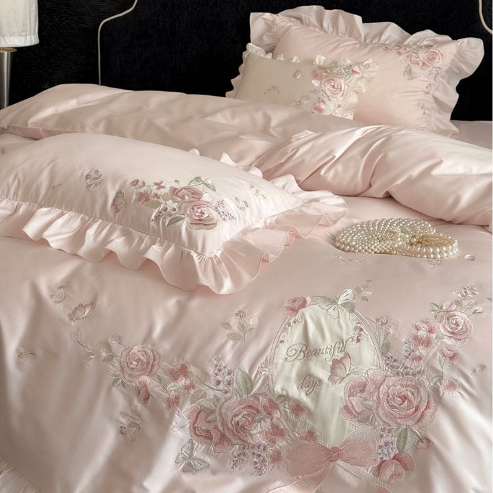 Luxurious satin bedding set with floral embroidery, ruffled edge and silky-matte finish Bowlift