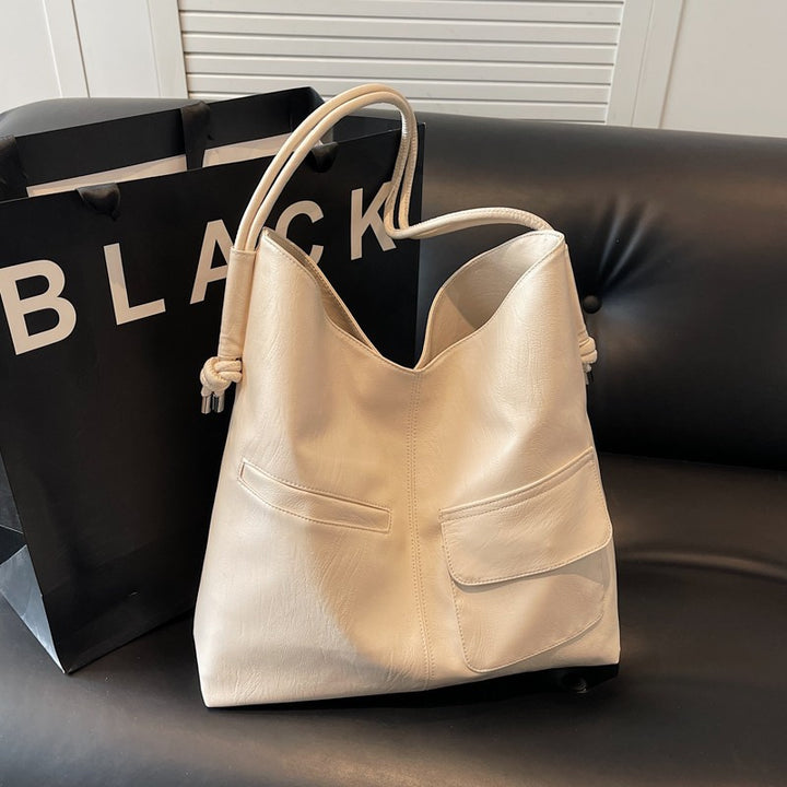 Casual tote bag with practical front pockets Bowlift