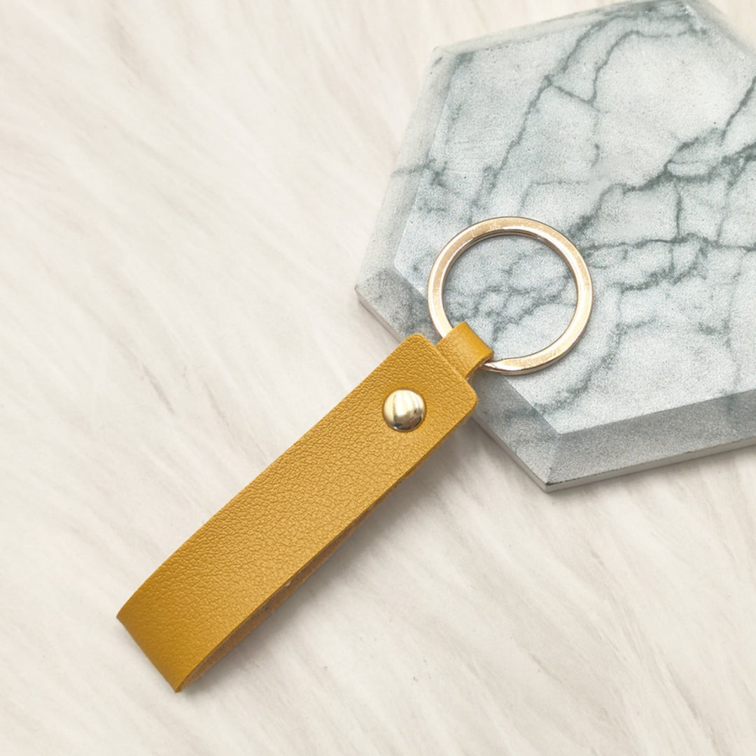 Unisex keychain with elegant artificial leather design Bowlift