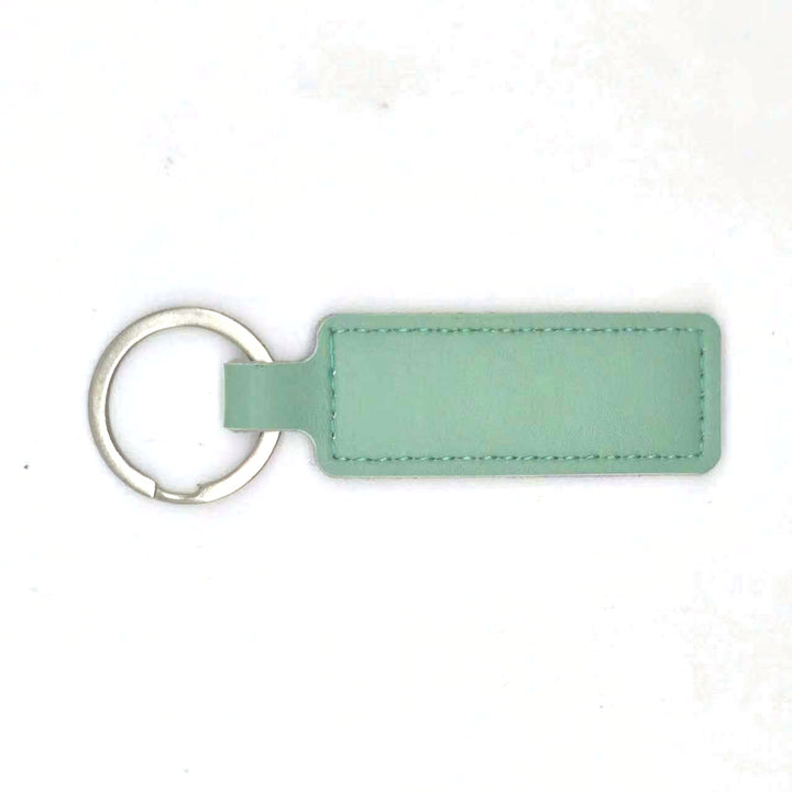 Unisex keychain with customizable faux leather Bowlift