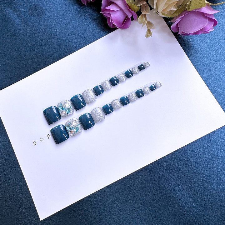 Artful toenail art with glitter and stone appliqués Bowlift