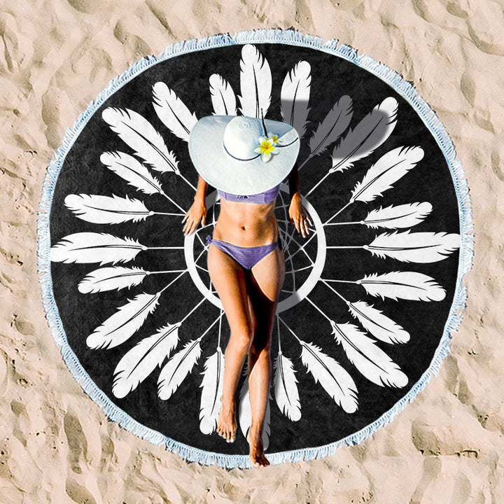 Round beach towel with tropical leaf print and fringe decoration Bowlift