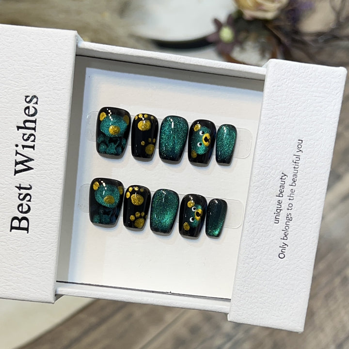 Artistic Press-On Nail Set with Playful Floral and Glitter Accents Bowlift