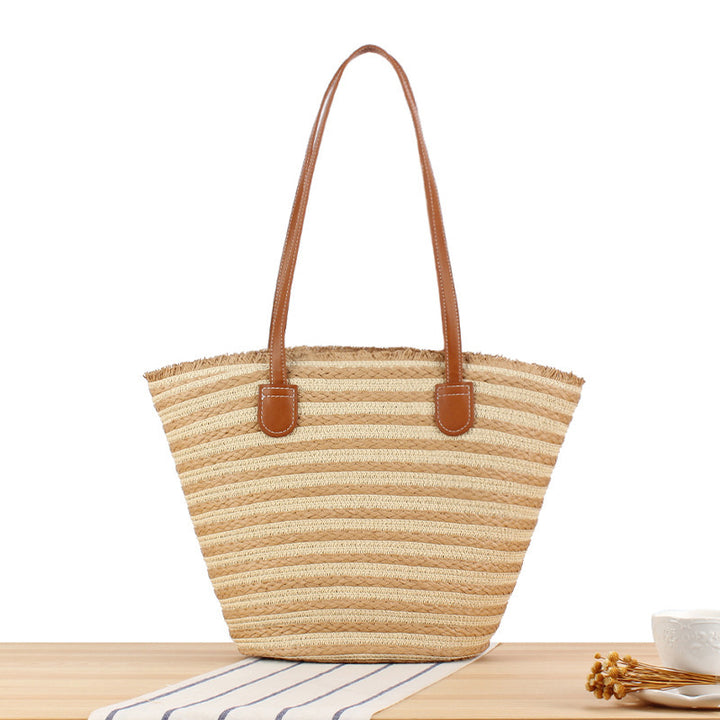Braided beach bag with modern stripes and sturdy handles Bowlift