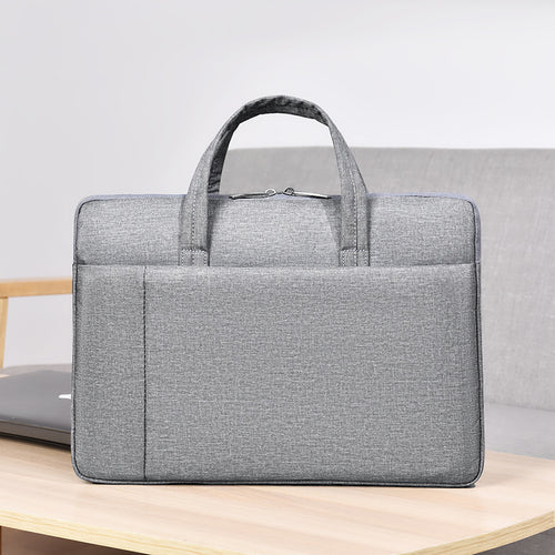 Laptop and briefcase in modern, minimalist design Bowlift