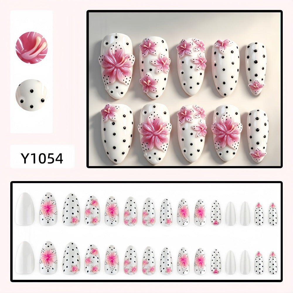 Artificial nail set with floral accents and polka dots Bowlift