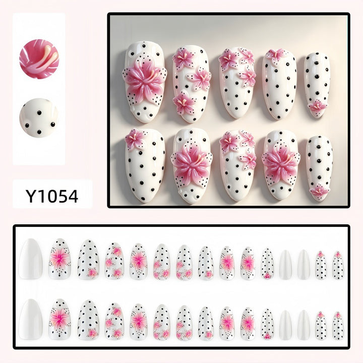 Artificial nail set with floral accents and polka dots Bowlift
