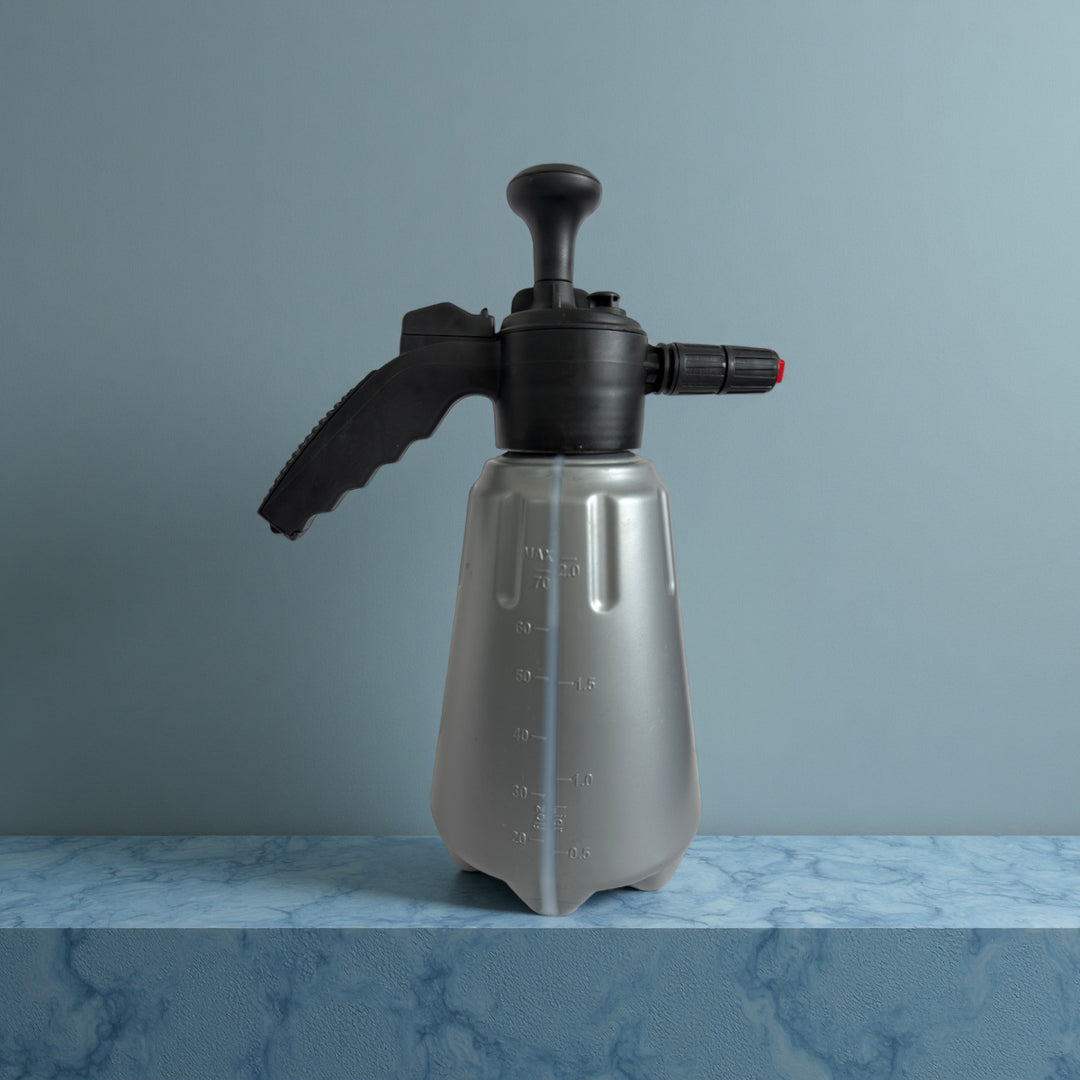 Pressurized handheld irrigation sprayer with ergonomic trigger and adjustable nozzle Bowlift