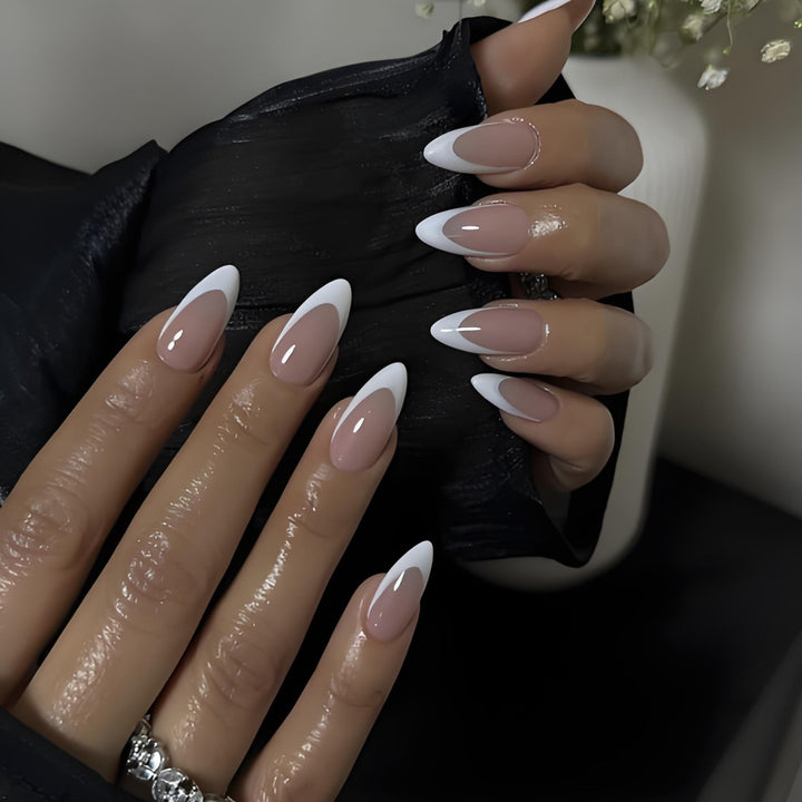 Artificial nails in elegant French tip style Bowlift