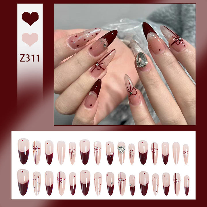 Artificial nail set with elegant bow and glitter details Bowlift