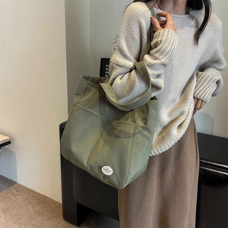 Multi-Pocket Utility Tote Bowlift