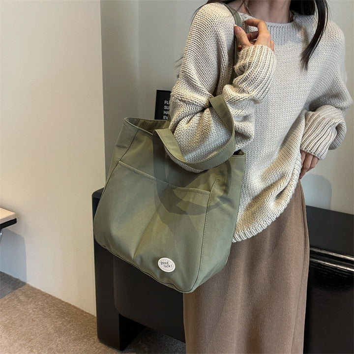 Multi-Pocket Utility Tote Bowlift