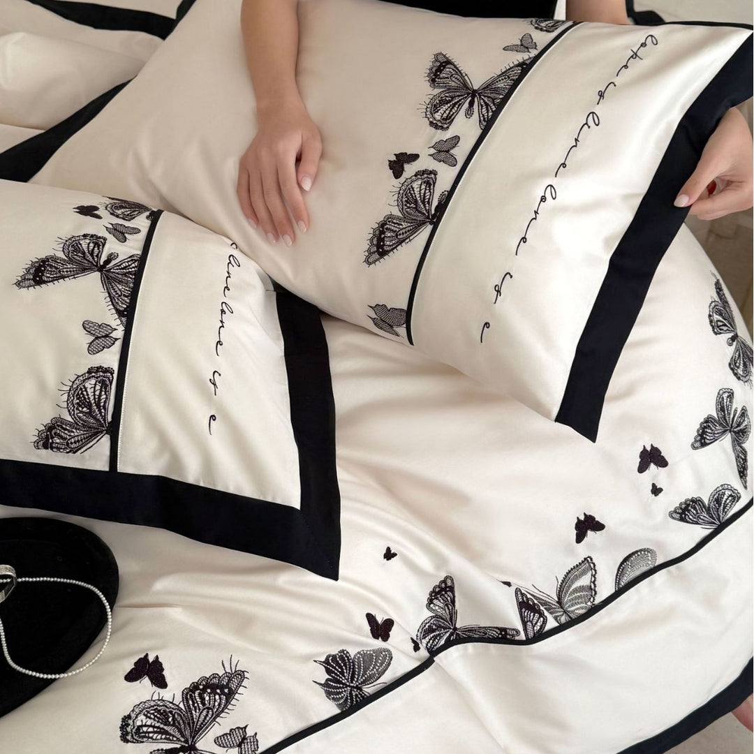 Luxurious cotton satin bedding set with butterfly embroidery and contrasting piping Bowlift
