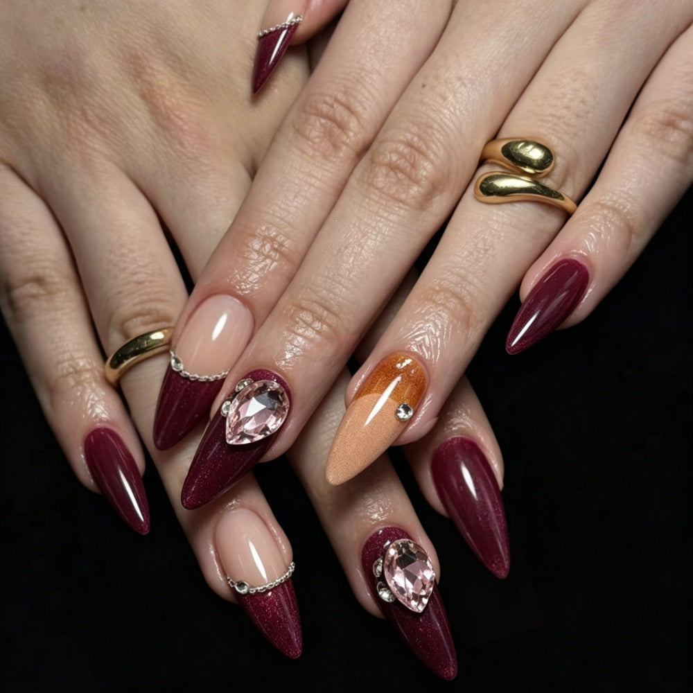 Artificial nails in elegant French design with glitter accents Bowlift