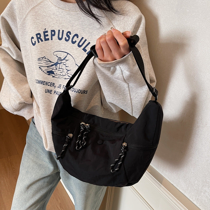 Practical shoulder bag with external zip pockets Bowlift
