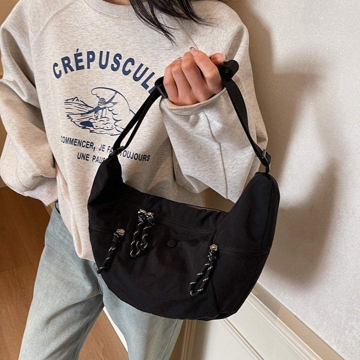 Practical shoulder bag with external zip pockets Bowlift