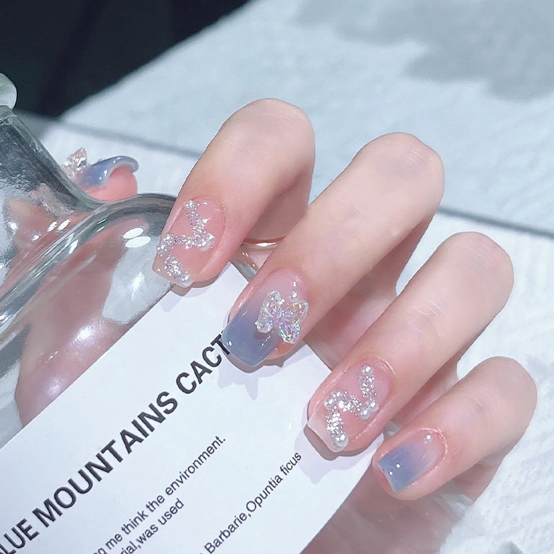 Acrylic nail set with sparkling glitter elements and appealing ombre design Bowlift