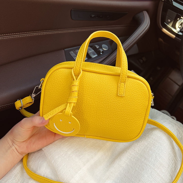 Compact Textured Mini Handbag Bowlift
