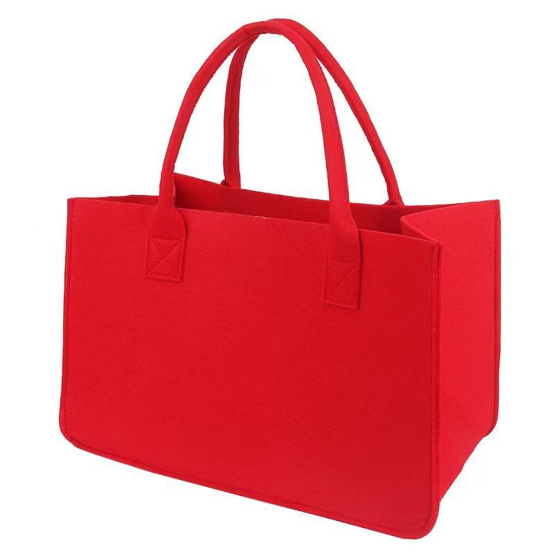 Structured felt tote bag with reinforced handles and organized interior Bowlift