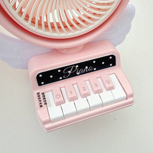 Portable table fan in playful piano design Bowlift