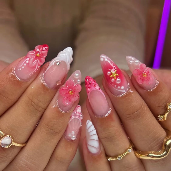 Artificial nails with 3D flower pattern and glitter accents Bowlift
