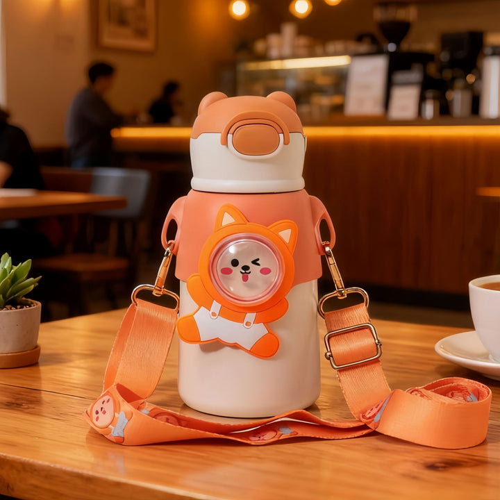 Insulated drinking bottle with integrated carrying strap Bowlift