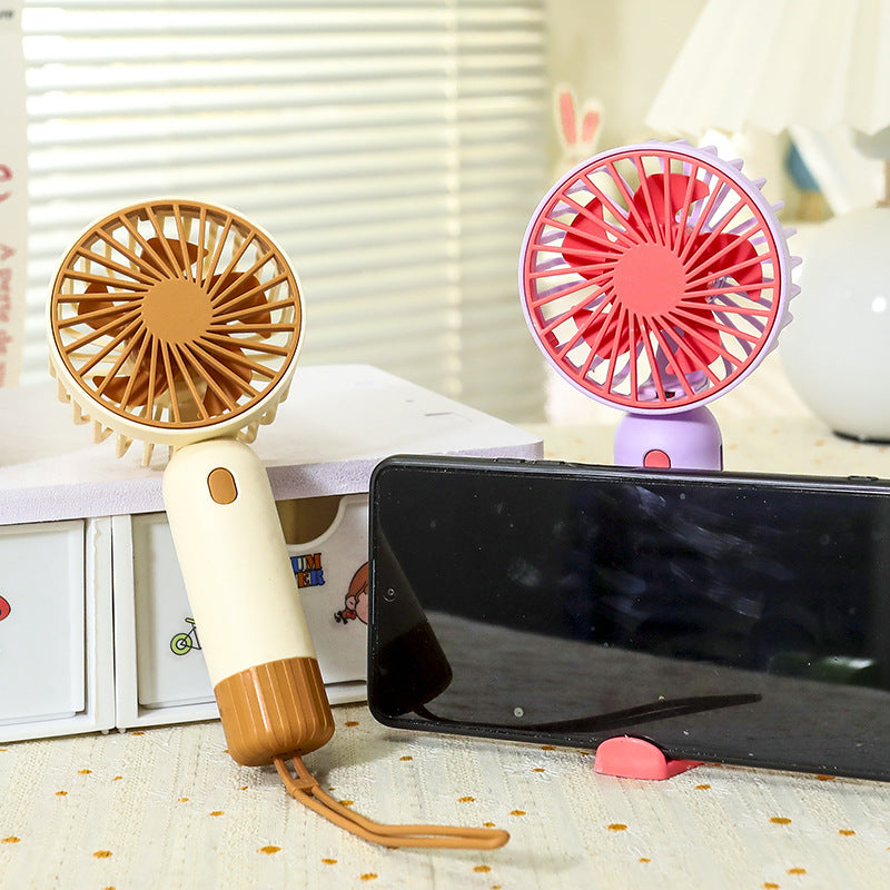 Portable hand fan with ergonomic grip and USB charging function Bowlift