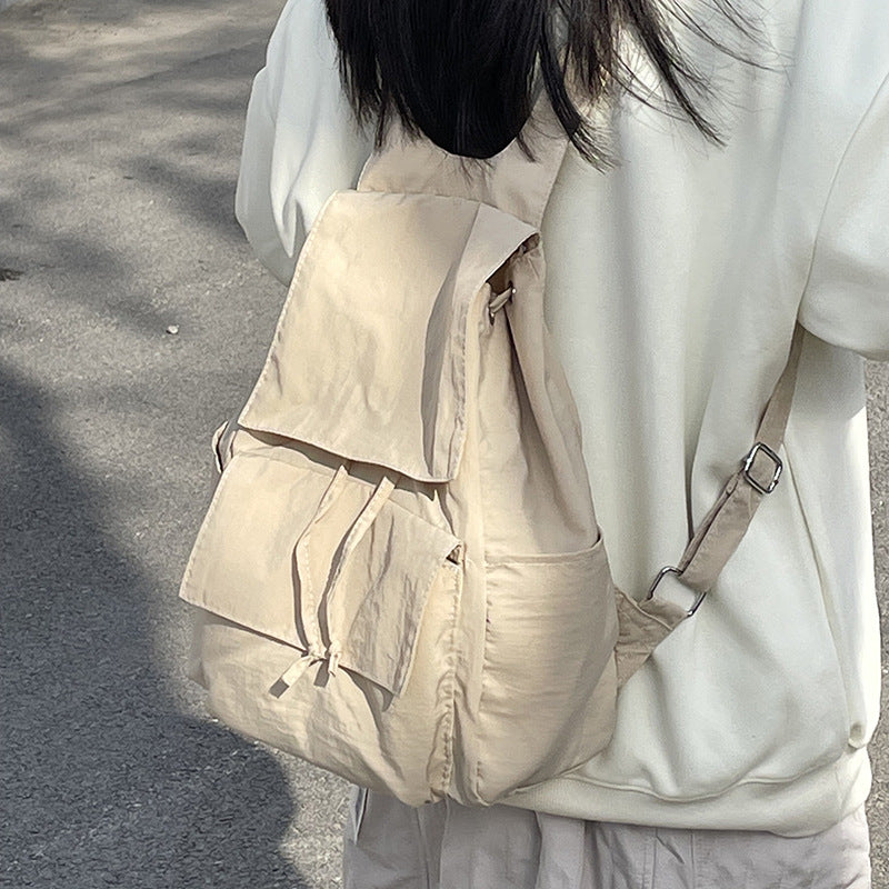 Versatile backpack with practical snap closure Bowlift