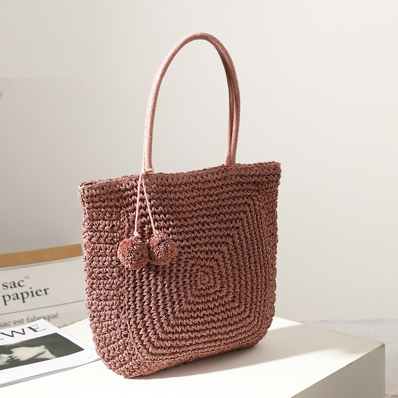 Handmade straw bag with pompom details Bowlift