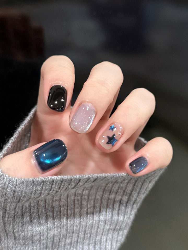 Artificial nails with elegant star design and shimmering effects Bowlift