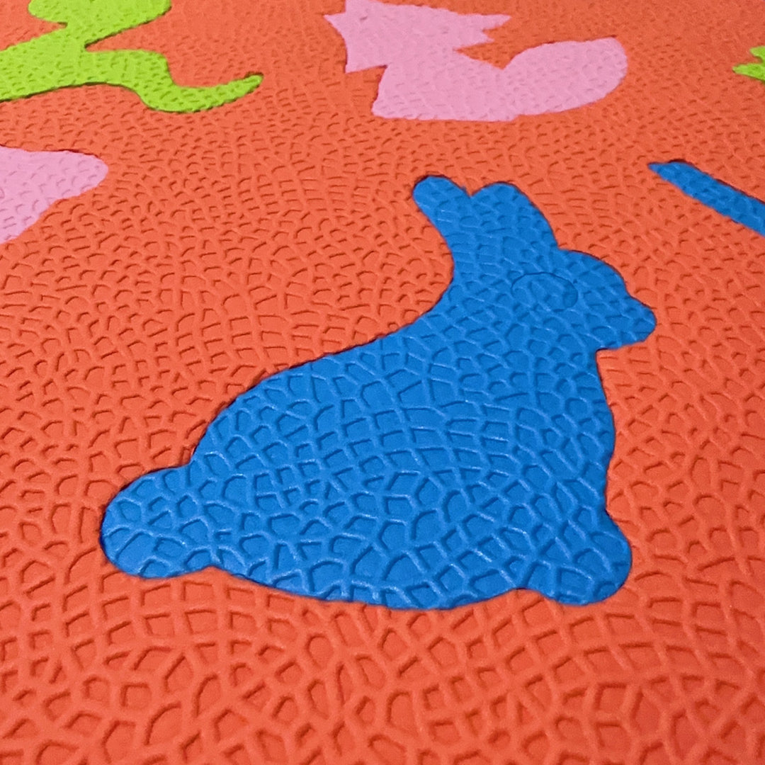 Learning play mat with animal motifs Bowlift