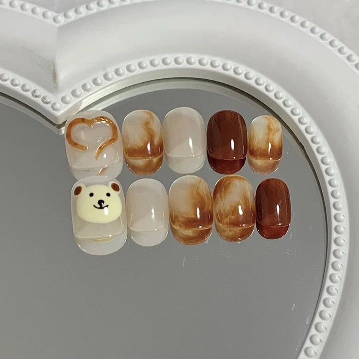Artificial nails with cute bear design and elegant color gradients Bowlift