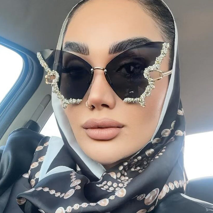 Women's large cat-eye sunglasses with sparkling rhinestone embellishment and elegant frame Bowlift