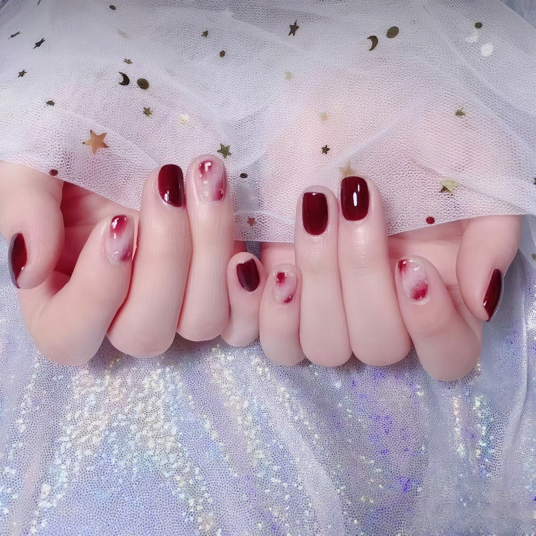Artificial nails in modern glitter gradient design Bowlift