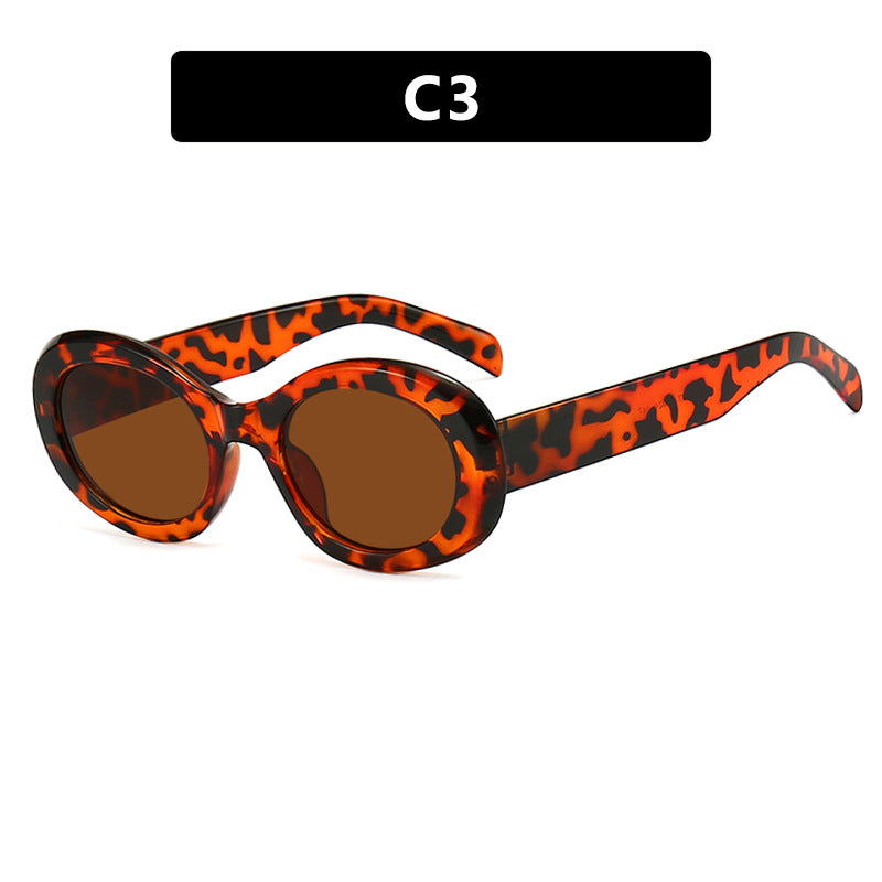 Women's fashionable sunglasses in original oval design with transparent frame and UV protection Bowlift