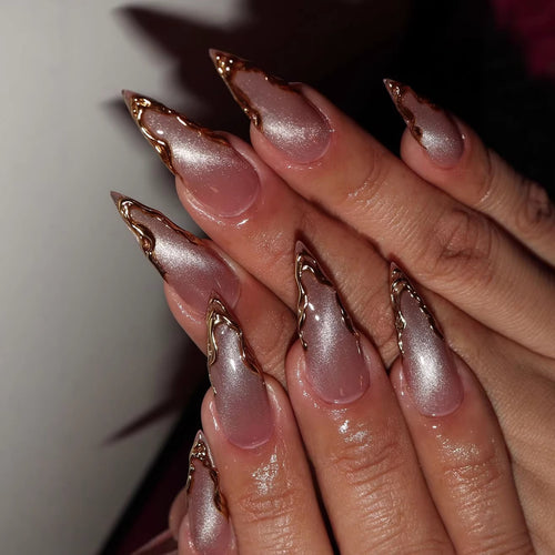 Artificial nails in an elegant style with gold accents Bowlift