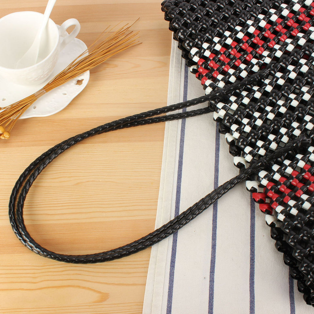 Stylish handbag made of braided material Bowlift