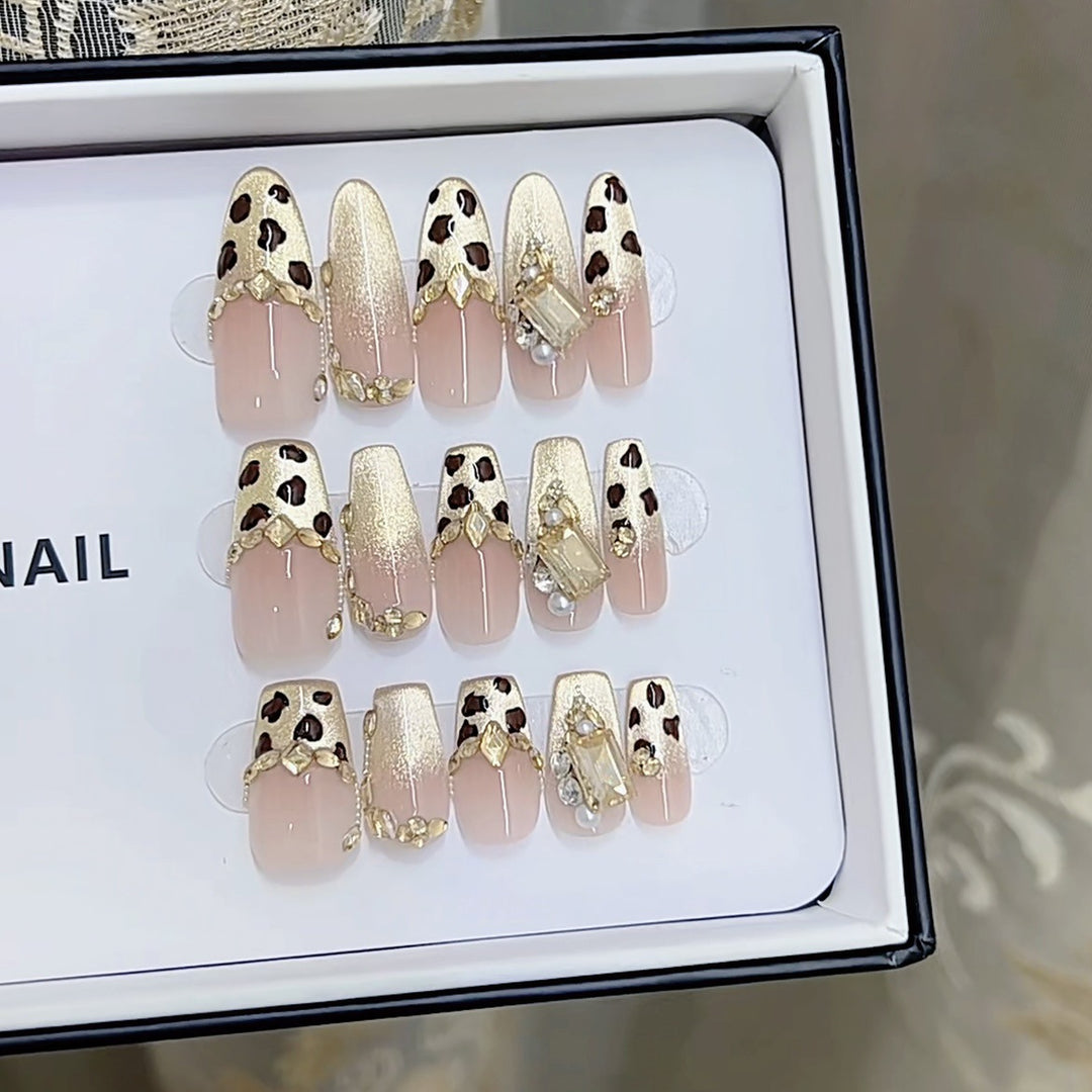 Artistic Press-On Nail Set with Leopard Accents Bowlift