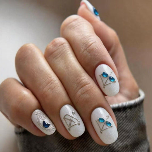 Artificial nails with elegant jewelry embellishments Bowlift