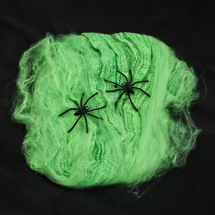 Decorative Halloween spider web with artificial spiders
