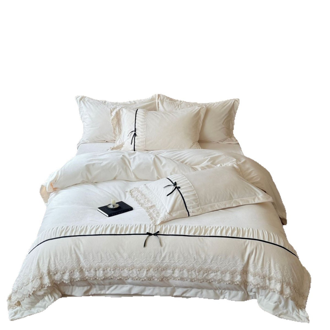 Romantic cotton satin bed linen set with ruffled hem, lace trim and decorative ribbons Bowlift