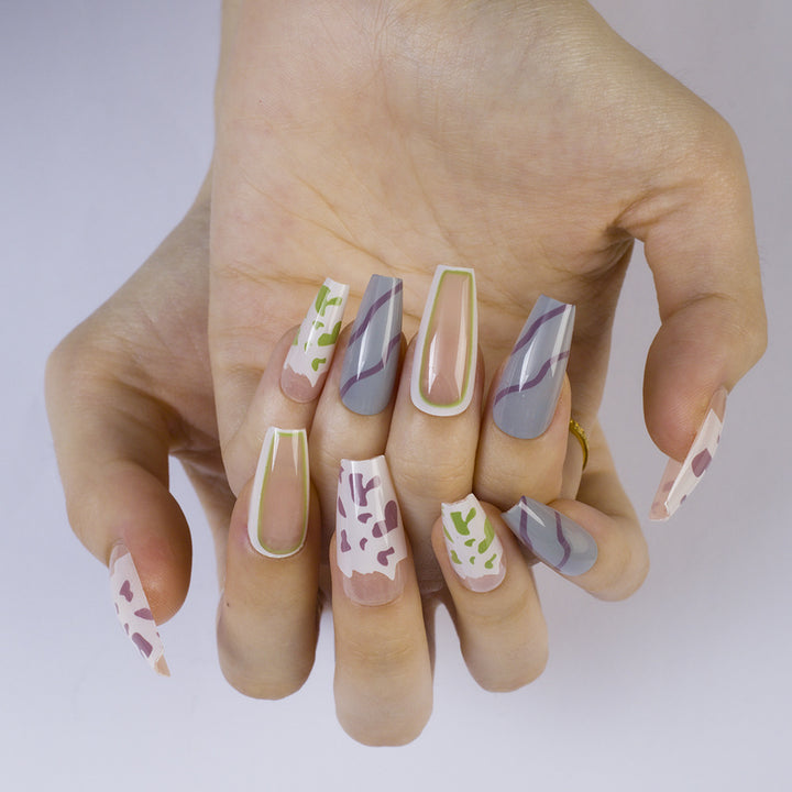Artificial nails in modern design with geometric patterns Bowlift