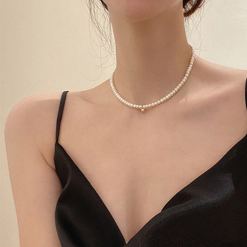 Delicate pearl necklace with elegant gold accent chain Bowlift
