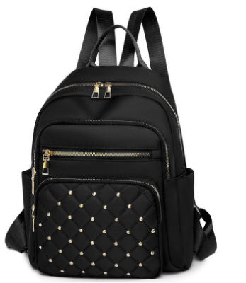 Women's Quilted Backpack with Decorative Studs Bowlift