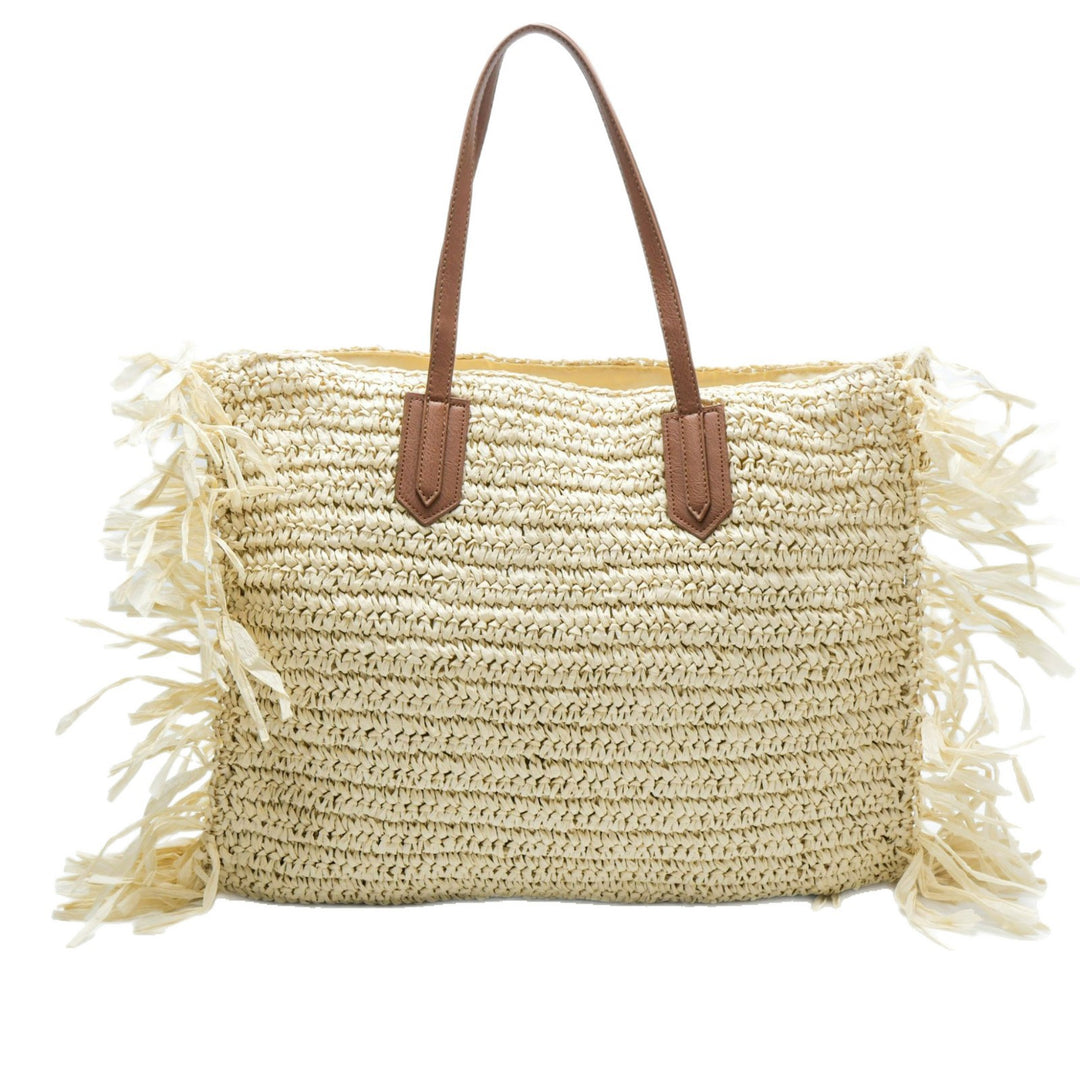 Beach bag made of handwoven straw with fringes Bowlift