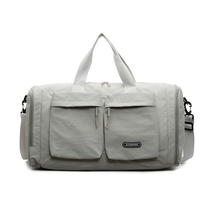 Sporty Travel Bag With Several Exterior Pockets Bowlift