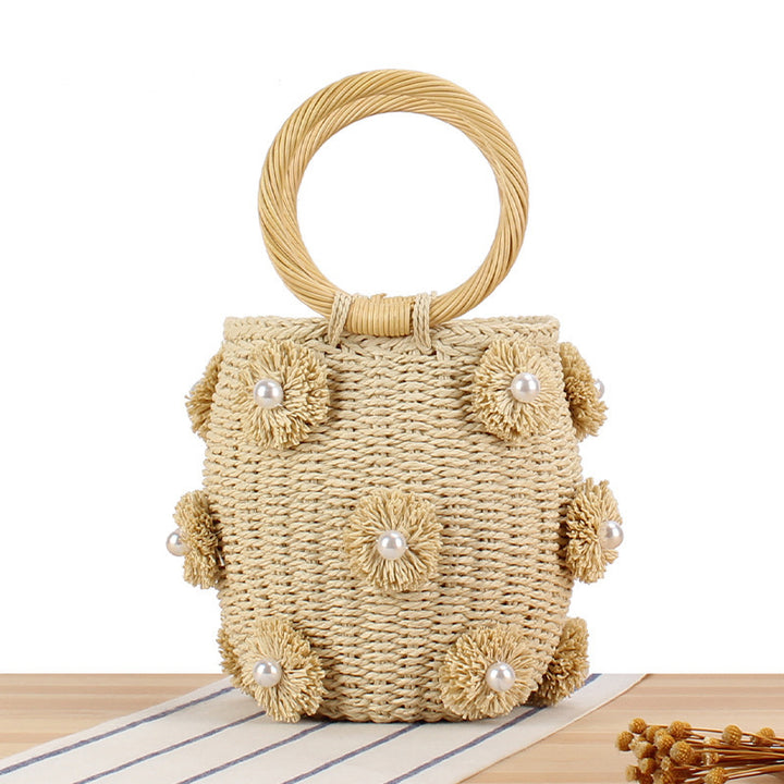 Handcrafted basket bag with bead appliqués Bowlift